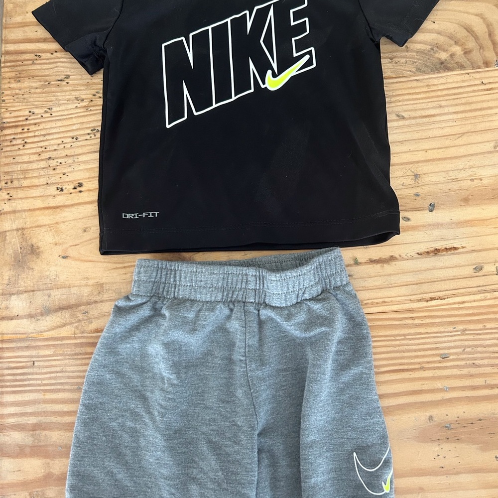 Nike Black Dri-FIT Tee with White Swoosh, size 18M